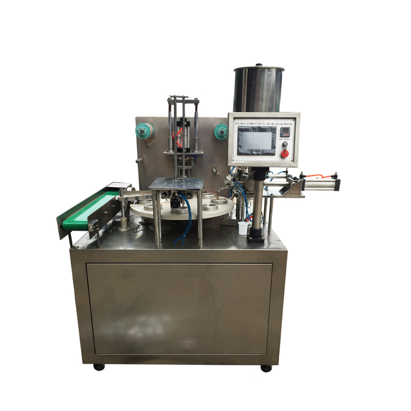 Машина для наполнения и запайки ротационных стаканов с роликовой пленкой для пасты